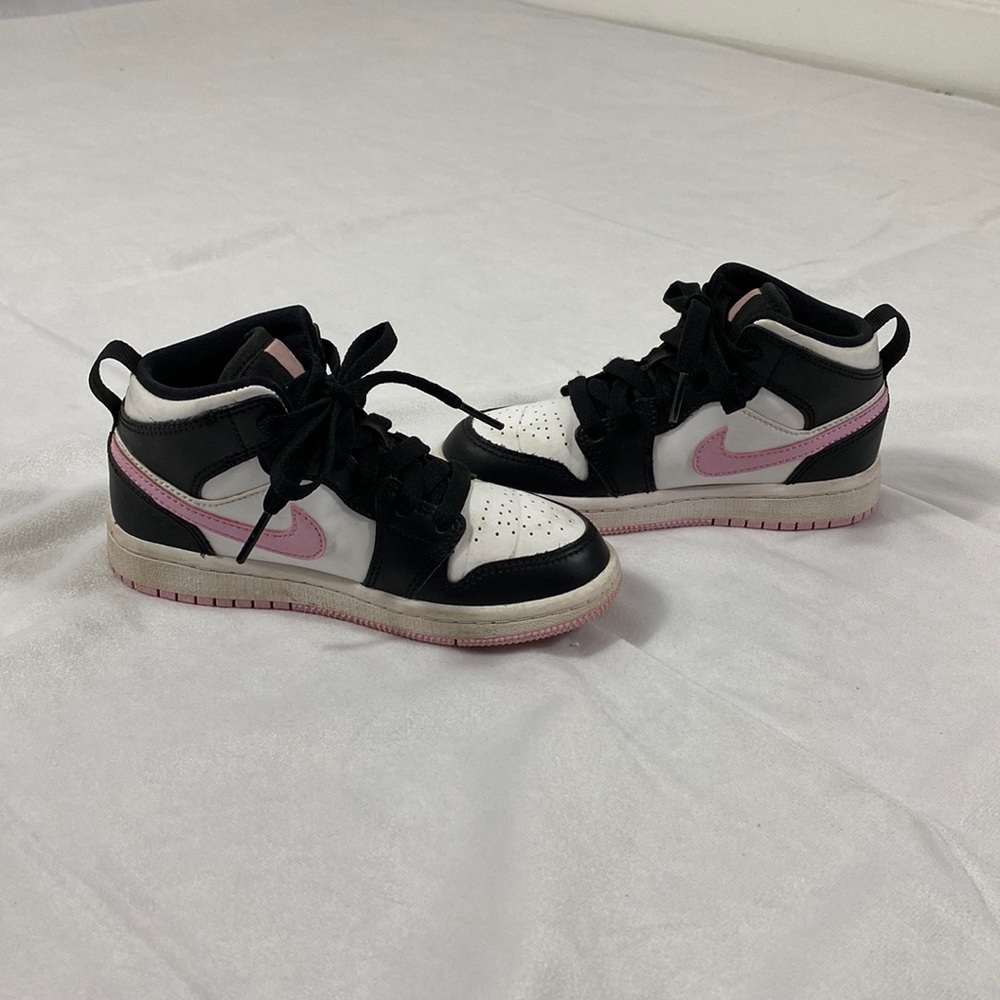 Pink and black Nike Air Jordan size 11